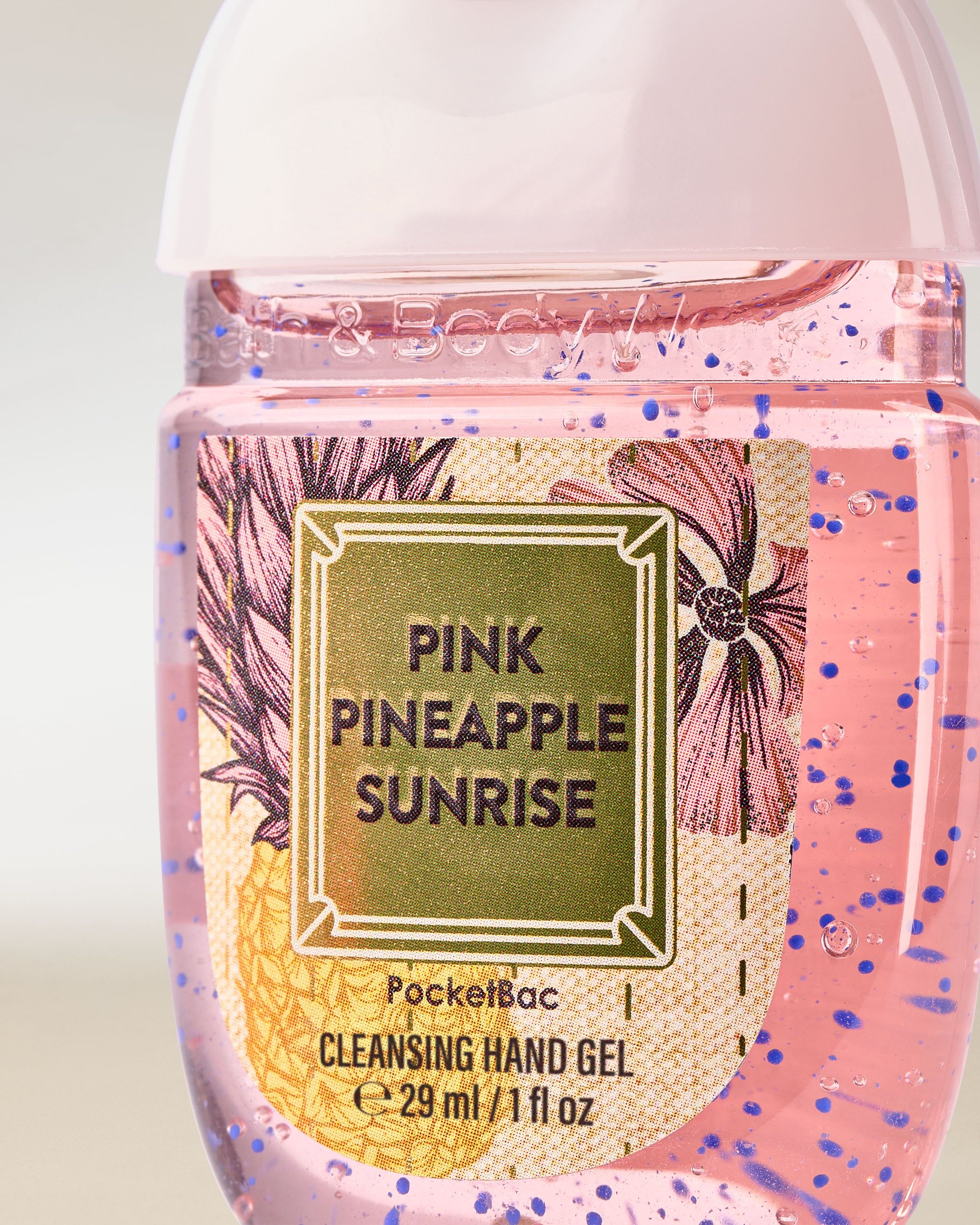PocketBac Pink Pineapple Sunrise – gel na ruce v růžovém obalu s bílým víčkem a ananasovou etiketou.