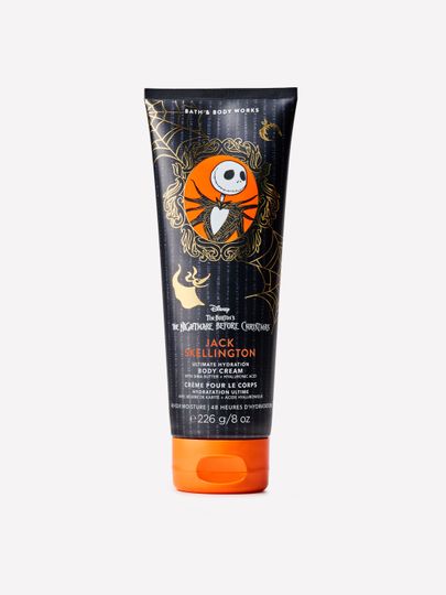 Krém na ruce Warm Vanilla Sugar Bath & Body Works s motivem vanilkových květů a zlatých detailů