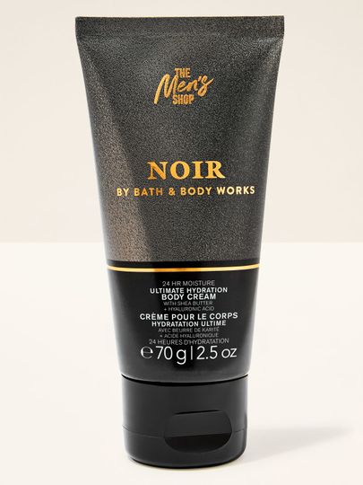 Tělový krém Bath&Body Works Noir. Malá, kovová tuba v černé barvě s nápisy ve zlaté barvě.