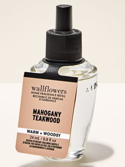 Náplň Wallflowers Mahogany Teakwood s teplou, dřevitou vůní v čiré lahvičce 24 ml.