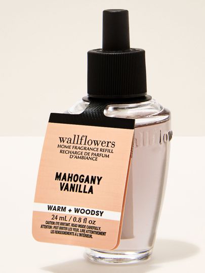 Náplň Wallflowers Mahogany Vanilla s teplou, dřevitou vanilkovou vůní ve světlé lahvičce 24 ml.