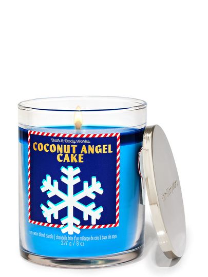 Świeca zapachowa "Coconut Angel Cake" z etykietą przedstawiającą duży biały płatek śniegu, Bath & Body Works.
