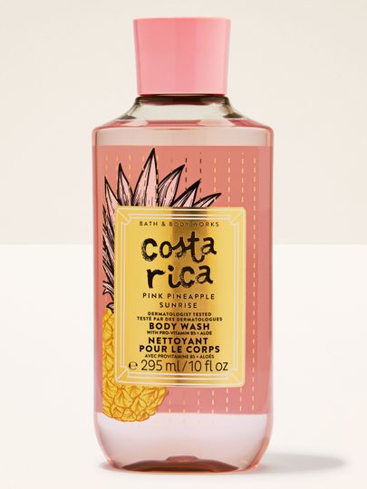 Sprchový gel Costa Rica Pink Pineapple Sunrise v růžové lahvi s tropickou etiketou a růžovým víčkem.