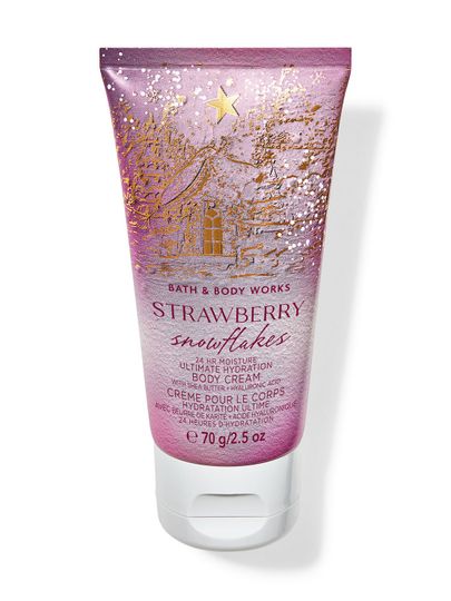 Mały krem do ciała "Strawberry Snowflakes" z motywem różowego, zimowego krajobrazu i gwiazdek. Bath & Body Works.