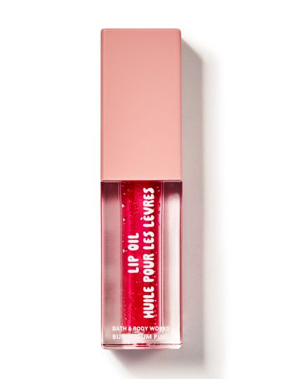 Olej na rty Bath & Body Works "Bubblegum Pink" v obdélníkovém balení s růžovou tekutinou.