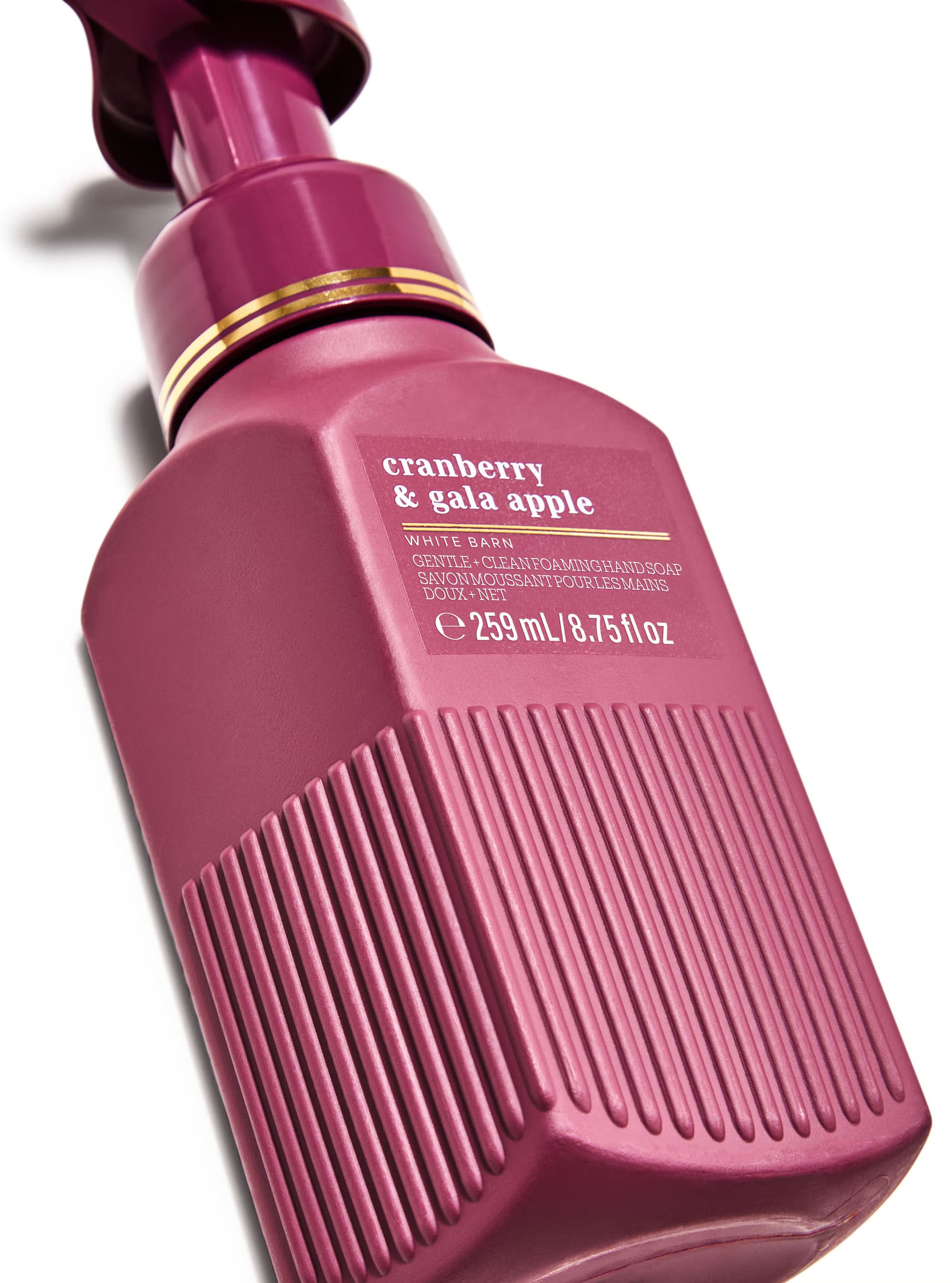 Pěnové mýdlo Cranberry & Gala Apple v bordovém obalu se svěží ovocnou vůní.
